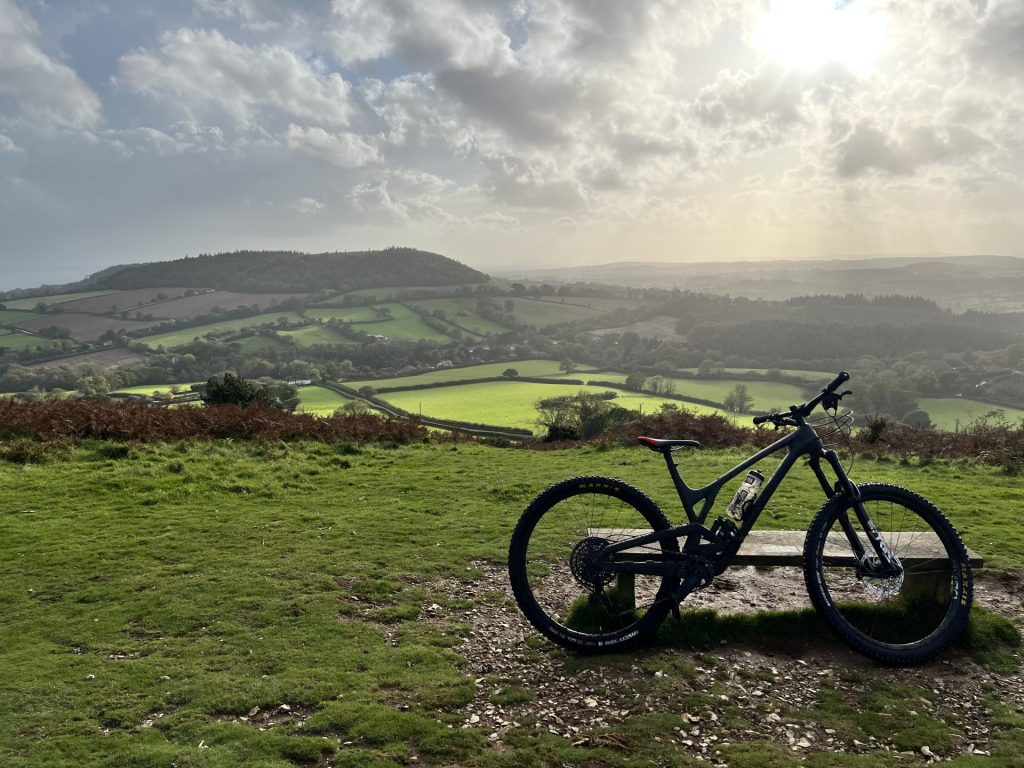 Bicycle in front of green mountains